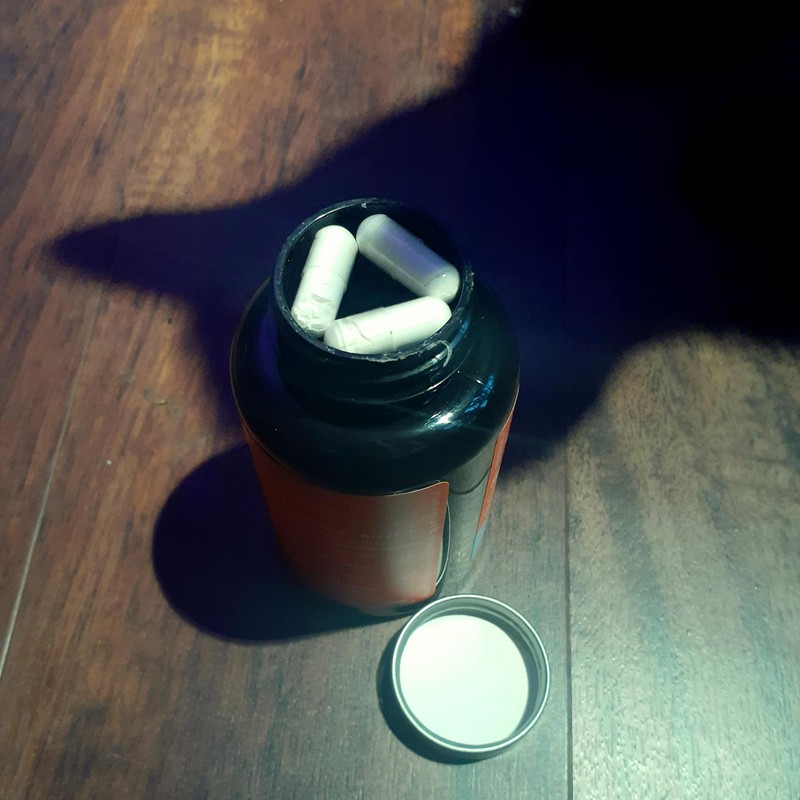 Vitaminpillen, die in einem perfekten Dreieck in die Packung passen, dass es einem ein gutes Gefühl gibt